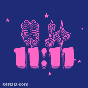 11:11 Is Displayed On A Blue Background With Stars GIF