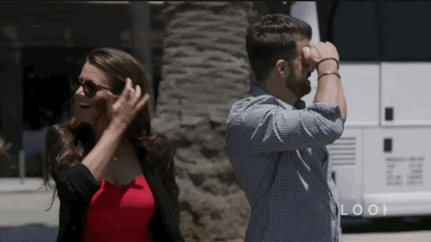 1St Look Couple Looking For Something GIF
