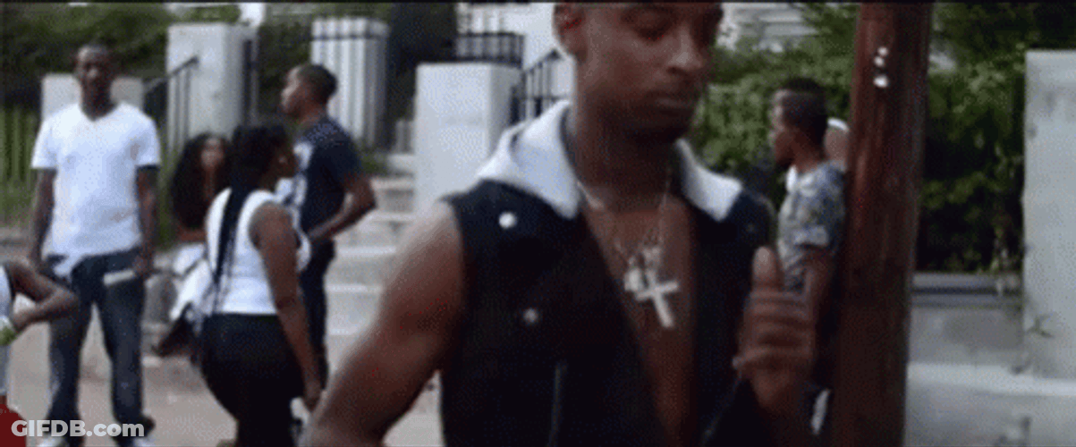 21 Savage Holding Cup While Walking GIF