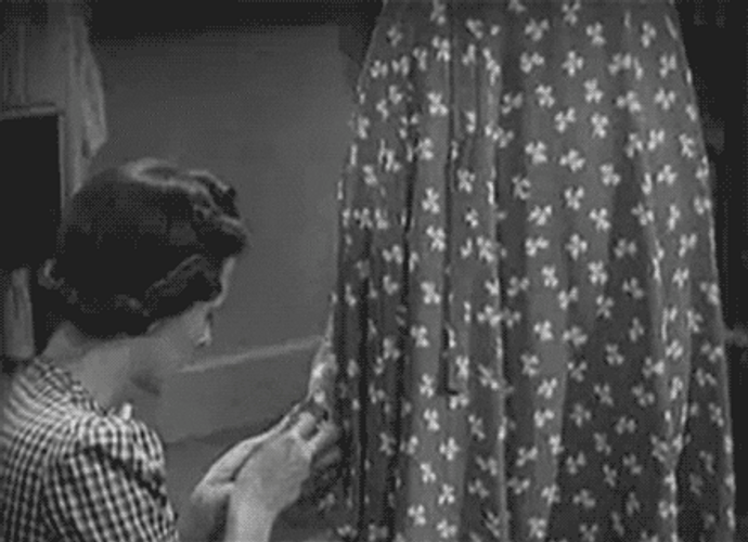 40S Lady Fixing Dress GIF