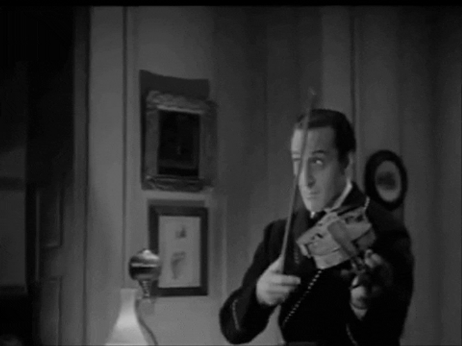 40S Man Playing Violin GIF