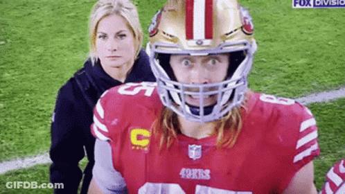 49Ers Football Player With Woman Behind GIF