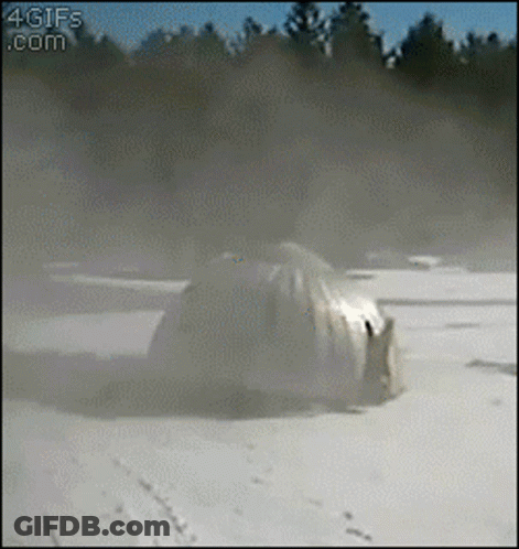 4Gifs Car Driving Through Snowy Field GIF