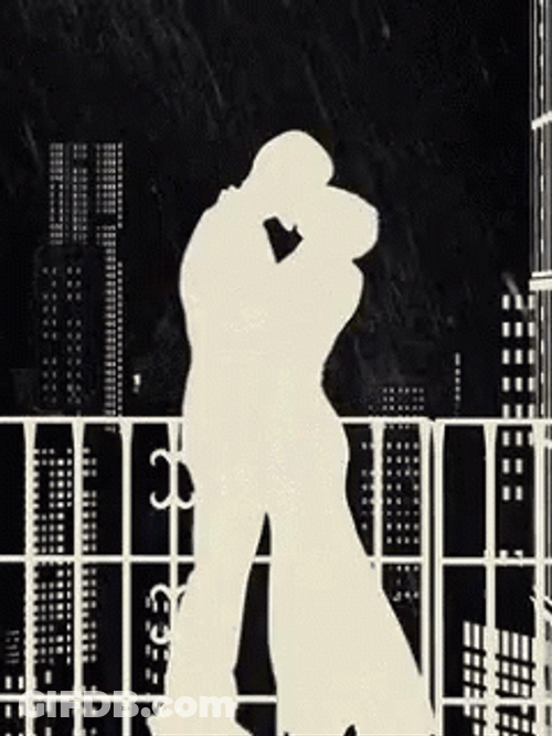 6 To Midnight Couple Kissing Rainy Night GIF