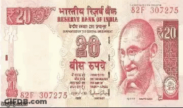 A 20 Rupee Banknote From The Reserve Bank Of India With A Picture Of Mahatma Gandhi On It . GIF