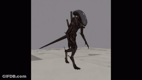 A 3D Model Of An Alien Walking On A Gray Surface GIF
