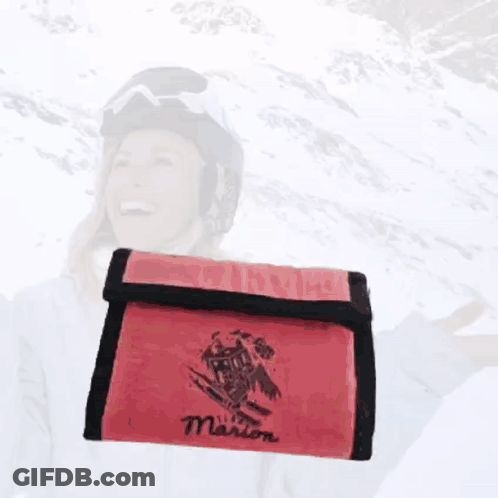 A 50 Euro Bill Next To A Red Wallet With The Name Marion On It GIF
