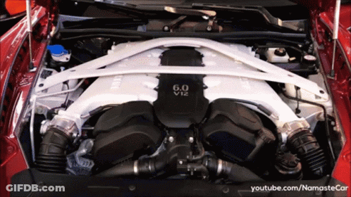 A 6.0 V12 Engine Is Shown With The Hood Up GIF