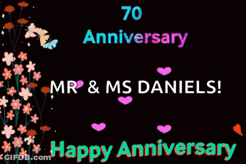 A 70Th Anniversary Greeting Card With Flowers And Butterflies GIF