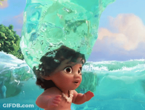 A Baby Doll Is Swimming In The Ocean With A Giant Ice Cube On Her Head GIF