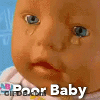 A Baby Doll With A Tear Coming Out Of It 'S Eye And The Words Poor Baby Written Below It GIF
