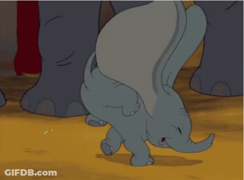 A Baby Elephant Is Crawling On The Ground With Its Trunk Outstretched GIF