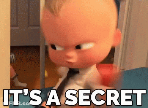 A Baby From The Boss Baby Movie Is Standing In A Doorway And Says `` It 'S A Secret '' . GIF