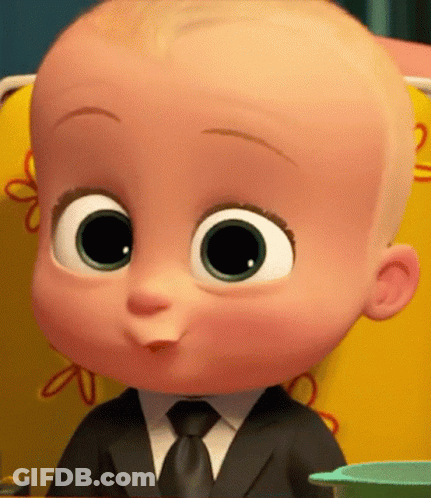 A Baby From The Boss Baby Movie Is Wearing A Suit And Tie And Sitting In A Chair . GIF
