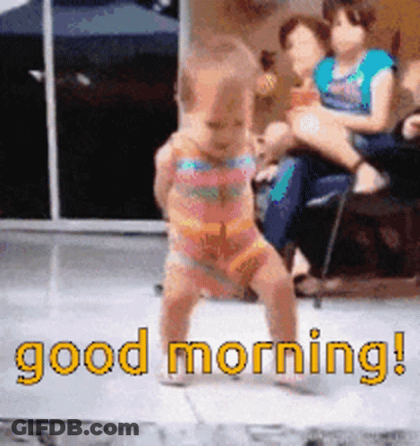 A Baby In A Bathing Suit Is Dancing In Front Of A Sign That Says " Good Morning " GIF