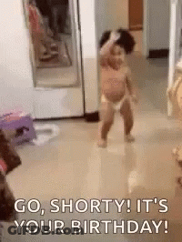A Baby In A Diaper Is Dancing In A Room With The Words `` Go Shorty ! It 'S Your Birthday '' . GIF