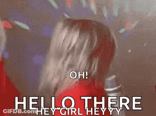 A Baby In A Red Jacket Is Holding A Cell Phone And Says Hello There . GIF