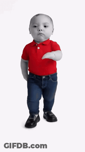A Baby In A Red Shirt And Blue Jeans Is Walking GIF