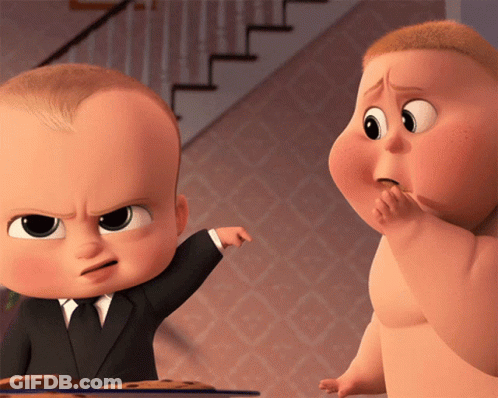 A Baby In A Suit And Tie Points At Another Baby GIF