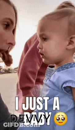 A Baby Is Being Held By A Woman With The Caption " I Just A Debaby " GIF