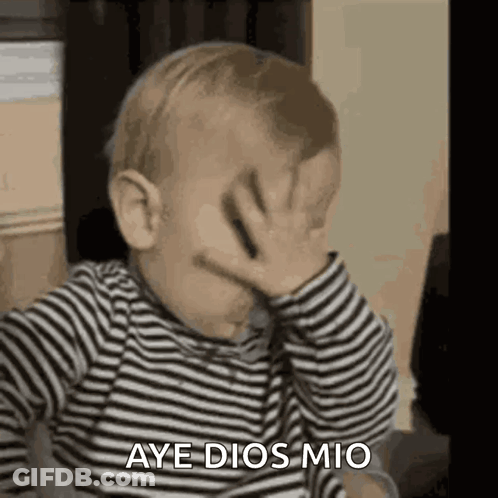 A Baby Is Covering His Face With His Hand And Saying Aye Dios Mio GIF