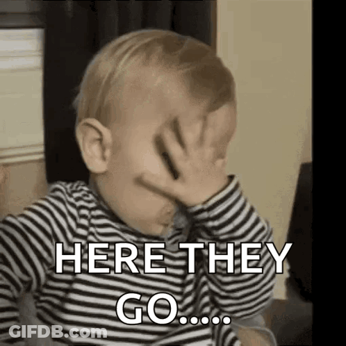 A Baby Is Covering His Face With His Hand And Saying `` Here They Go ... '' . GIF