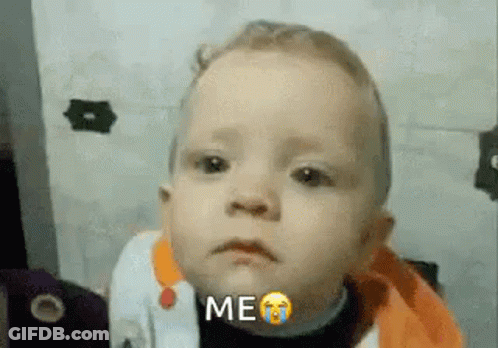 A Baby Is Crying And Making A Funny Face With The Words `` Me '' . GIF