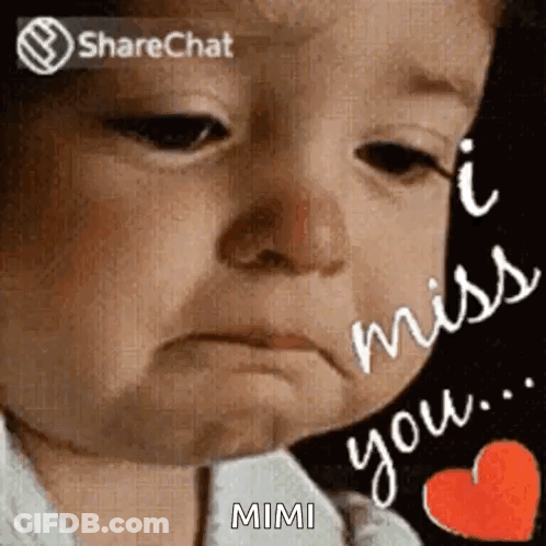A Baby Is Crying And Saying `` I Miss You '' Next To A Red Heart . GIF
