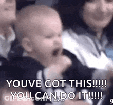 A Baby Is Crying In A Crowd Of People And Says `` You 'Ve Got This ! '' GIF