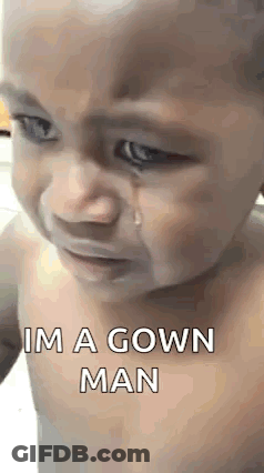 A Baby Is Crying With A Tear Coming Out Of His Eye And Says `` Im A Gown Man '' . GIF