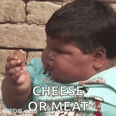 A Baby Is Eating A Piece Of Cheese With The Words Cheese Or Meat Written On It . GIF