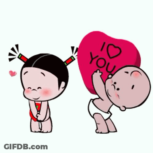 A Baby Is Holding A Heart That Says `` I Love You '' . GIF
