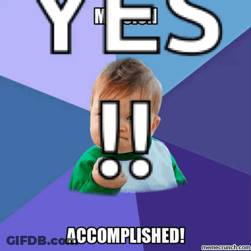 A Baby Is Holding Up A Fist And Says Yes Accomplished GIF