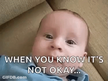 A Baby Is Laying On A Couch With The Words `` When You Know It 'S Not Okay ... '' Written On It . GIF