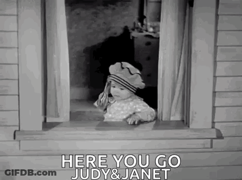 A Baby Is Looking Out Of A Window With The Words `` Here You Go Judy & Janet '' . GIF