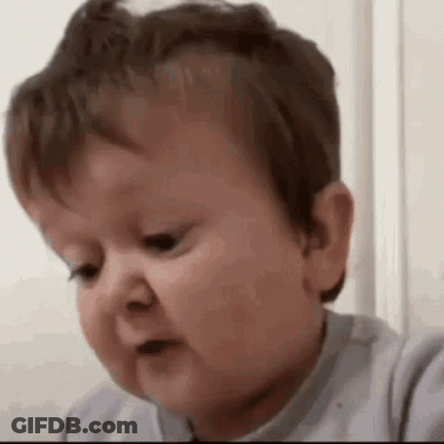 A Baby Is Making A Funny Face And Making A Funny Face . GIF