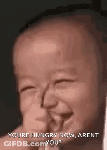 A Baby Is Making A Funny Face And Saying `` You 'Re Hungry Now , Arent You ? '' GIF