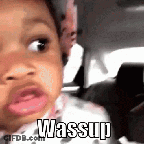 A Baby Is Making A Funny Face And The Word Wassup Is Visible GIF