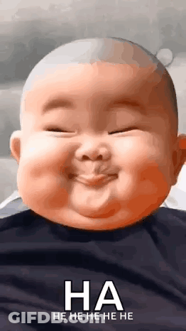 A Baby Is Making A Funny Face With His Eyes Closed And Laughing . GIF