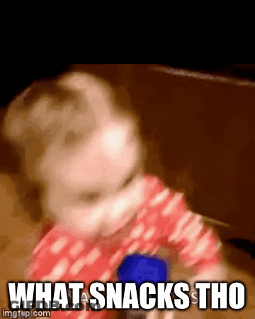 A Baby Is Playing With A Blue Object And The Words What A Snacks Tho Are Visible GIF