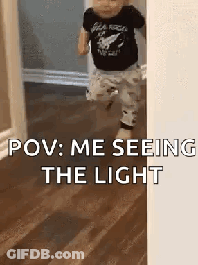 Baby Running Through Hallway With Light Text GIF