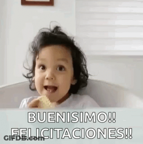 A Baby Is Sitting In A Bathtub And Eating A Cookie . GIF