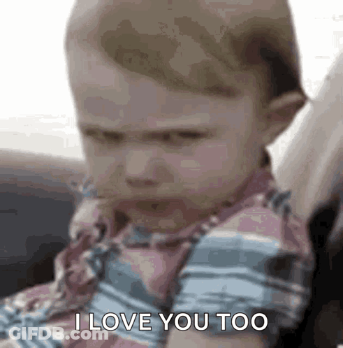 A Baby Is Sitting In A Car Seat And Saying I Love You Too . GIF