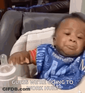 A Baby Is Sitting In A High Chair Drinking From A Bottle And Crying . GIF