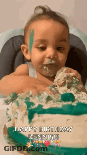 A Baby Is Sitting In A High Chair Eating A Birthday Cake With His Face Covered In Frosting . GIF