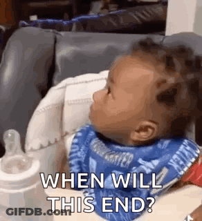 A Baby Is Sitting In A High Chair With A Bib On And A Bottle . GIF