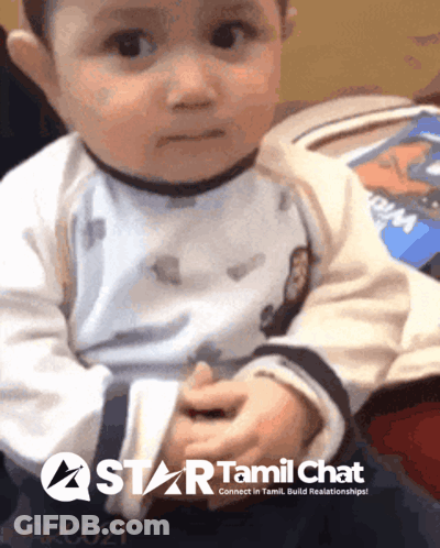 A Baby Is Sitting In Front Of A Star Tamil Chat Advertisement GIF