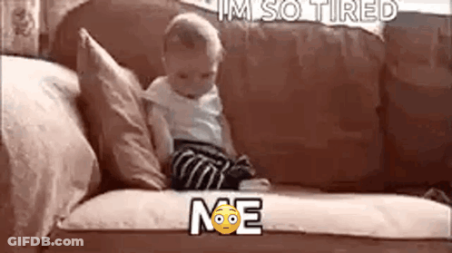 A Baby Is Sitting On A Couch With The Words `` I 'M So Tired '' Written Above Him . GIF
