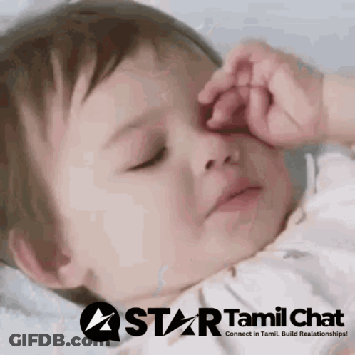 A Baby Is Sleeping With A Star Tamil Chat Logo Behind It GIF