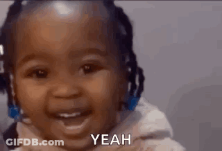 A Baby Is Smiling And Saying Yeah In A Video . GIF